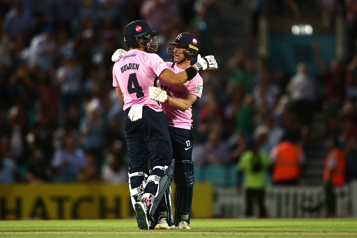 Max Holden and Jack Davies celebrate Middlesex's astonishing chase