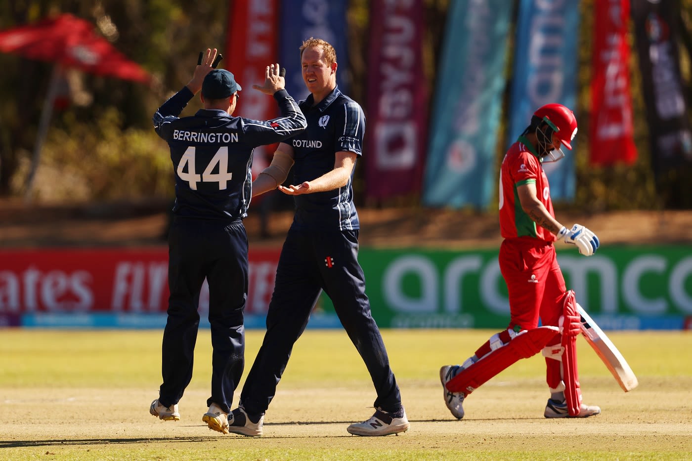 Adrian Neill celebrates the wicket of Jatinder Singh