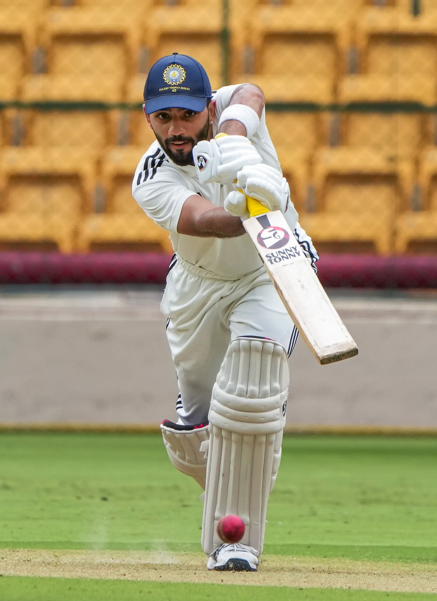 Dhruv Shorey drives one back down the ground