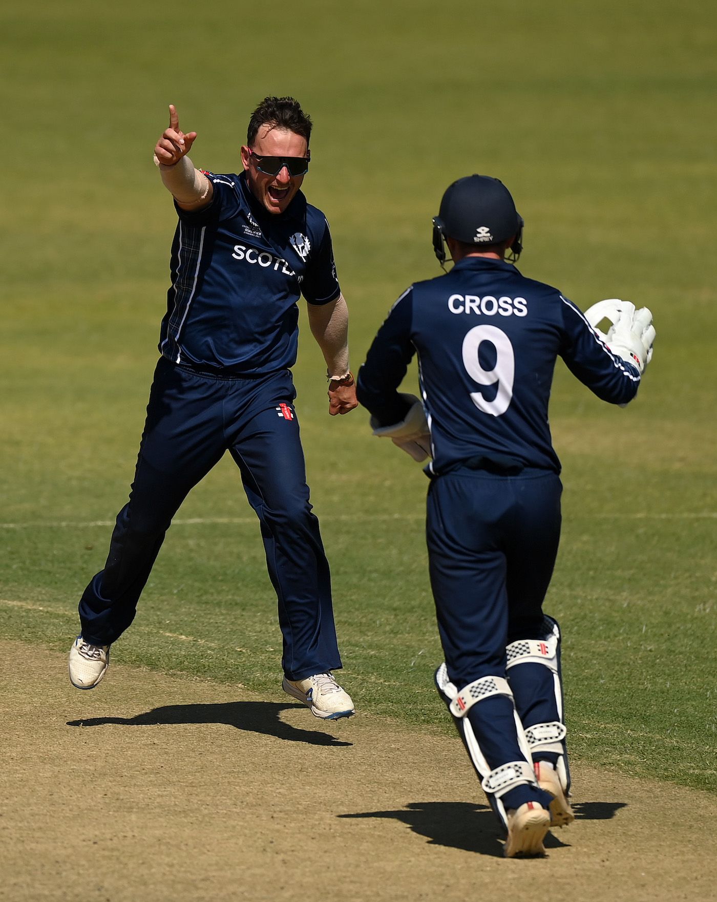 Chris Greaves celebrates after getting Jason Holder lbw
