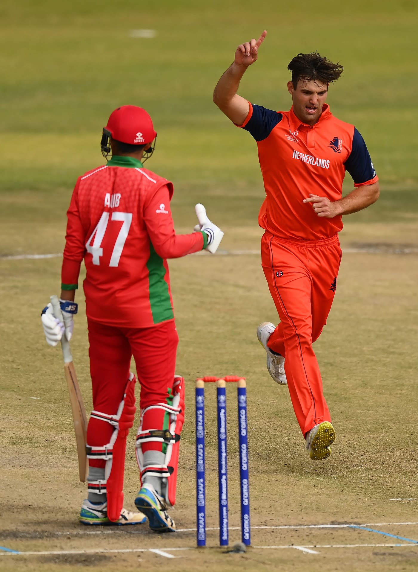 Ryan Klein celebrates another Oman wicket