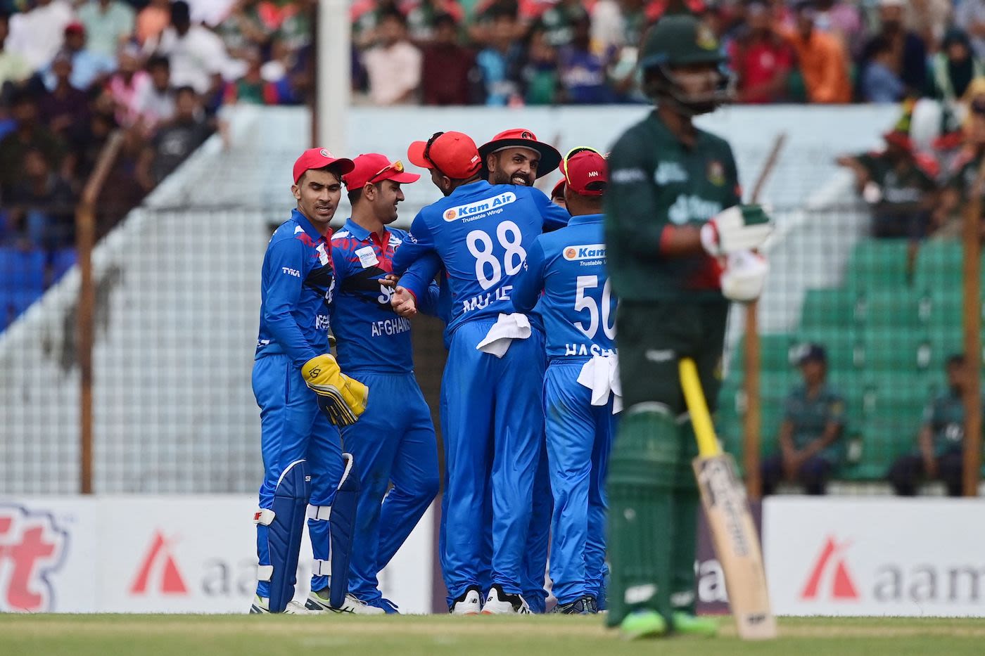 Mohammad Nabi took a sharp catch to effect the first wicket after the rain break