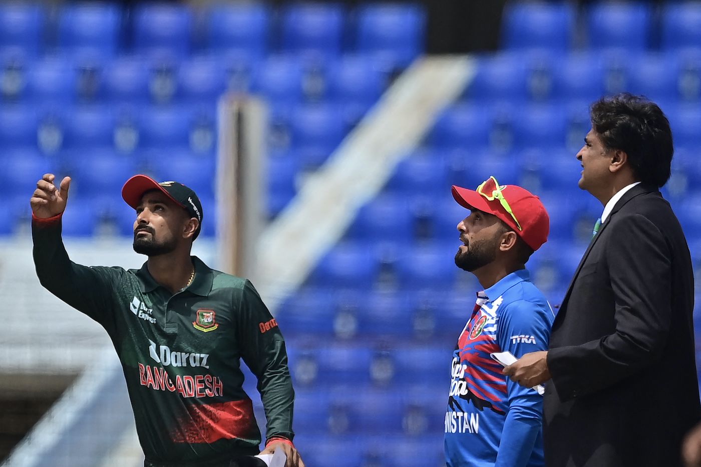 Litton Das and Hashmatullah Shahidi with Match Referee Javagal Srinath at the toss