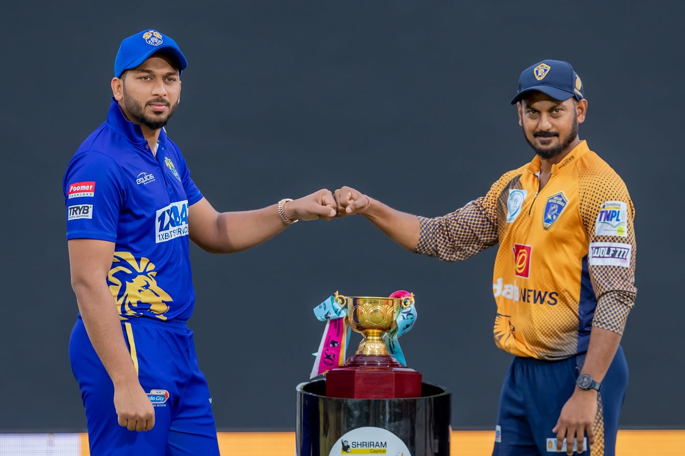 Lyca Kovai Kings captain M Shahrukh Khan and Nellai Royal Kings captain KB Arun Karthik pose with the TNPL trophy