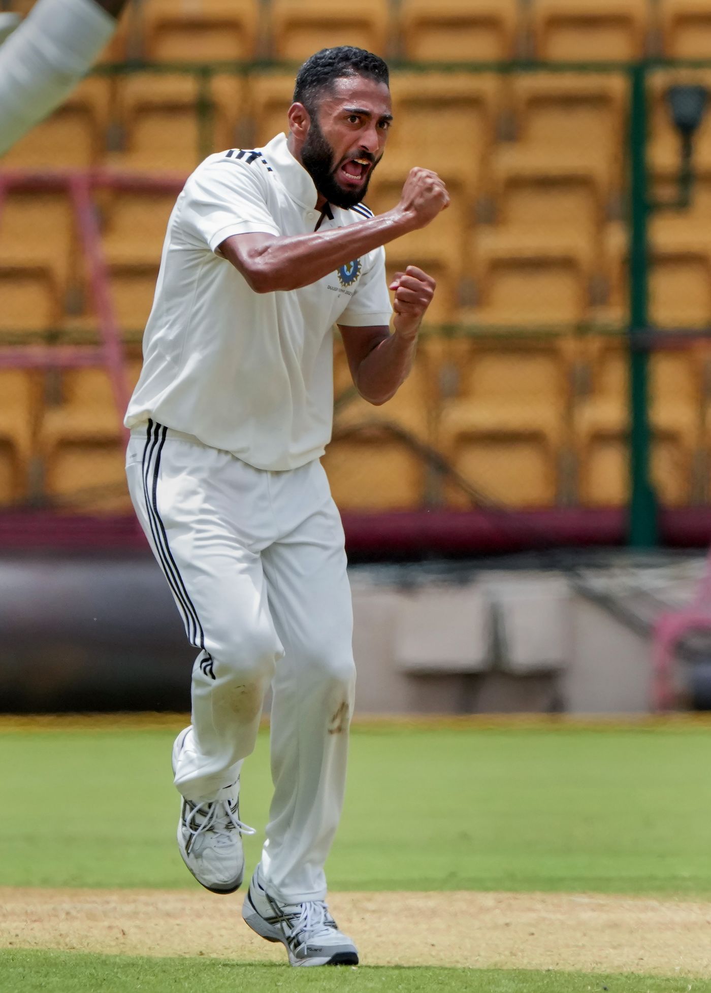 Arzan Nagwaswalla celebrates a wicket