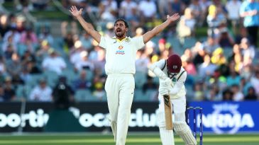 How many bowlers have dismissed a father and a son in Tests?