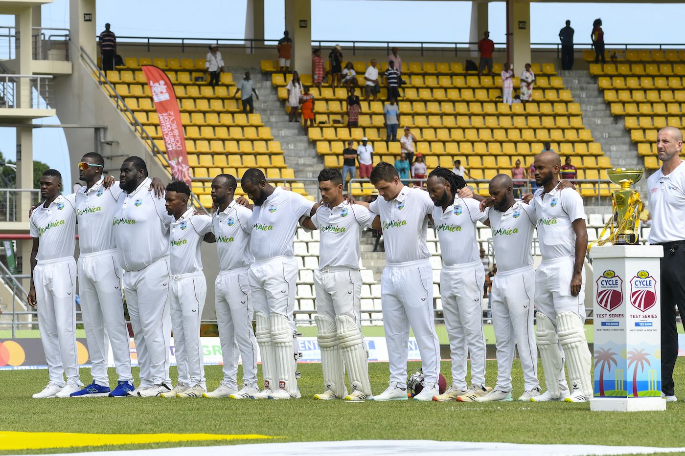 West Indian players line up for the national anthem