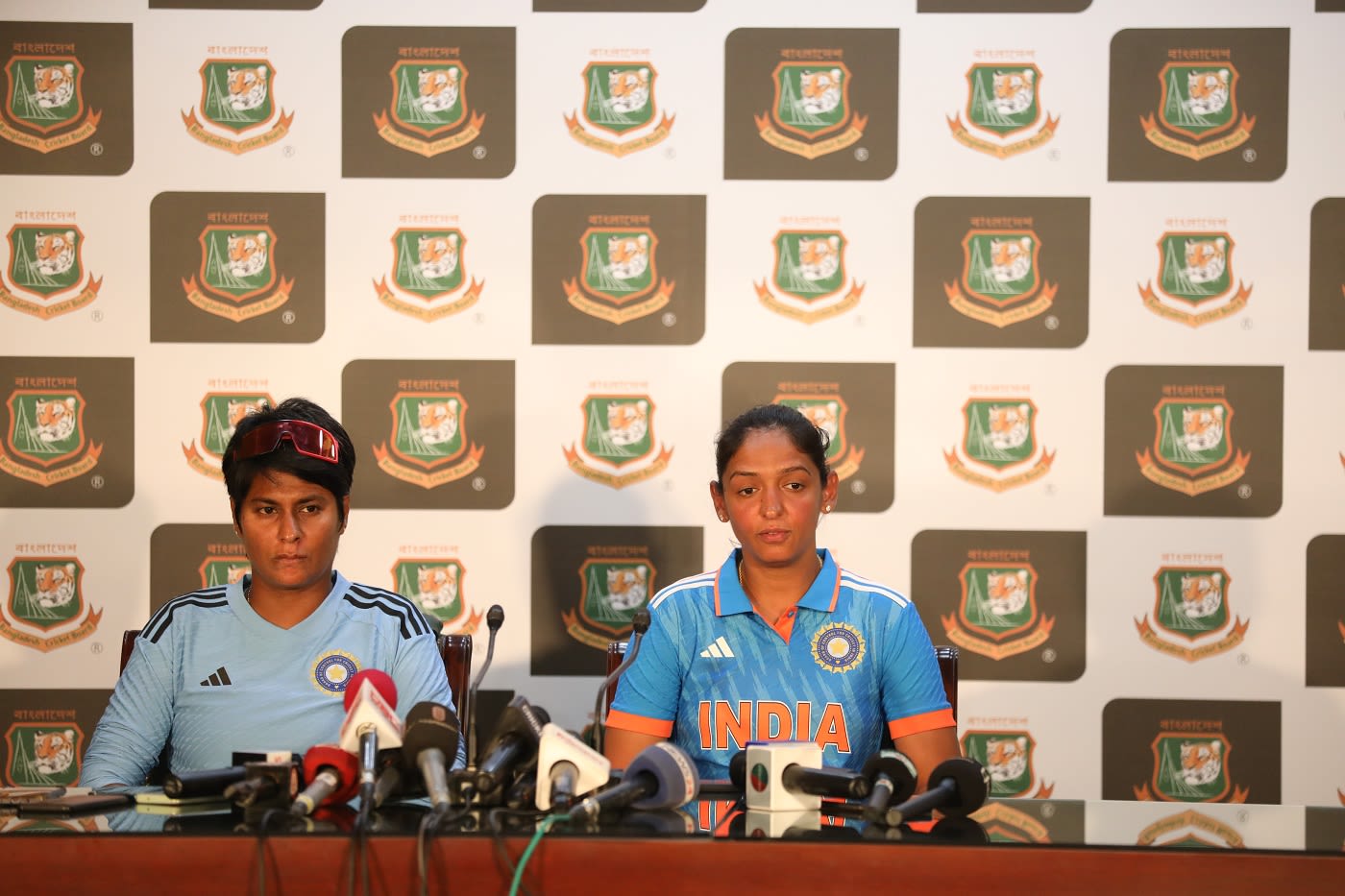 Interim head coach Nooshin Al Khadeer and captain Harmanpreet Kaur address the press