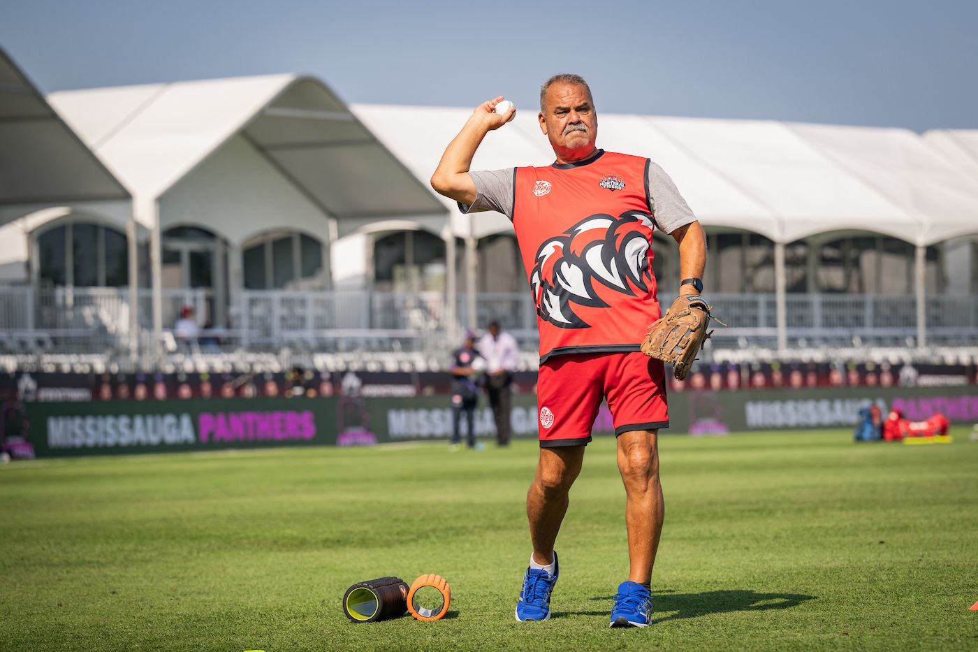 Montreal Tigers head coach Dav Whatmore does some fielding drills