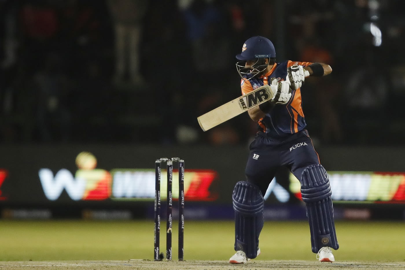 Karim Janat starred with an unbeaten 48 after picking up two wickets