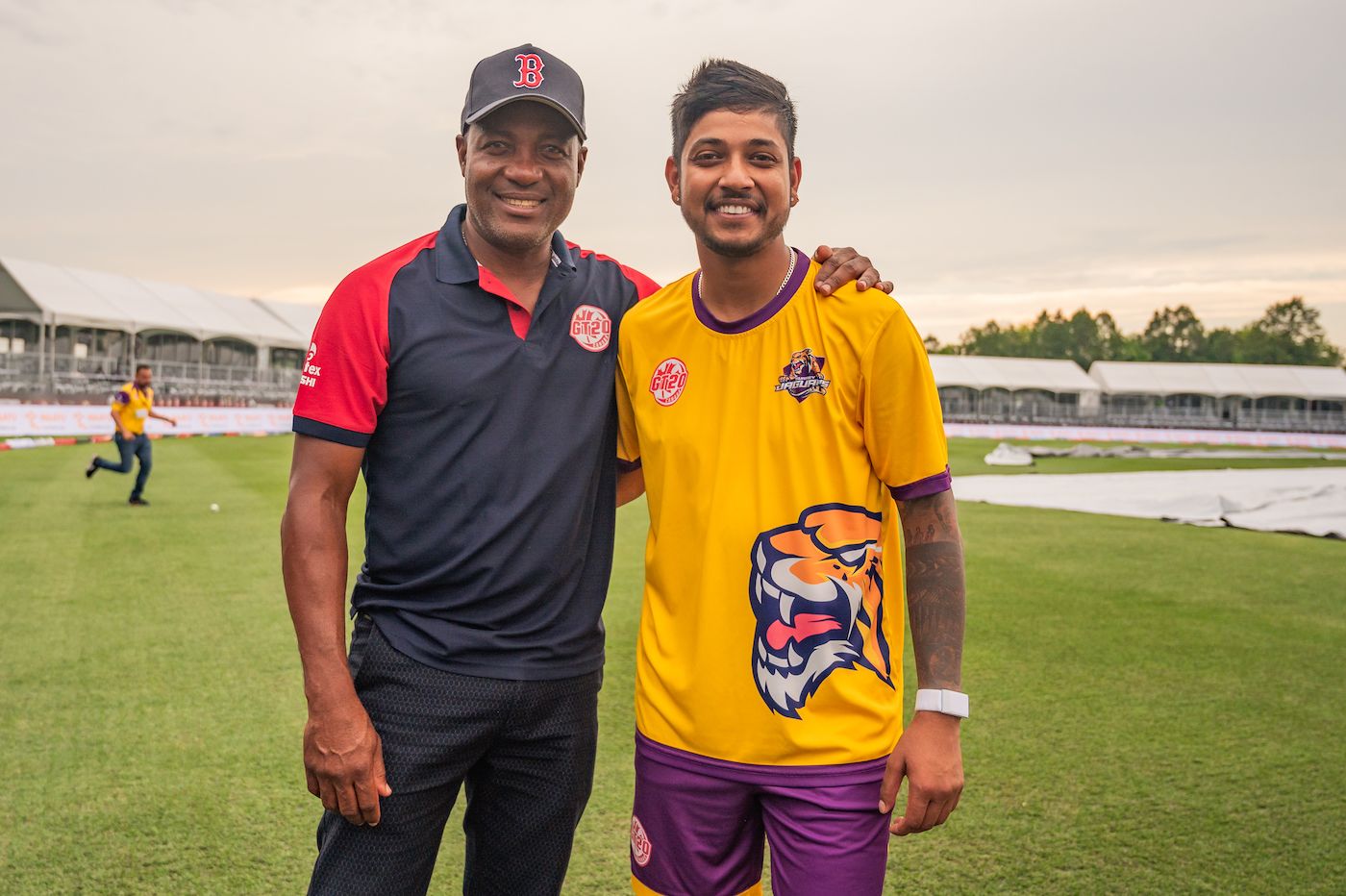 Brian Lara and Sandeep Lamichhane pose for a picture