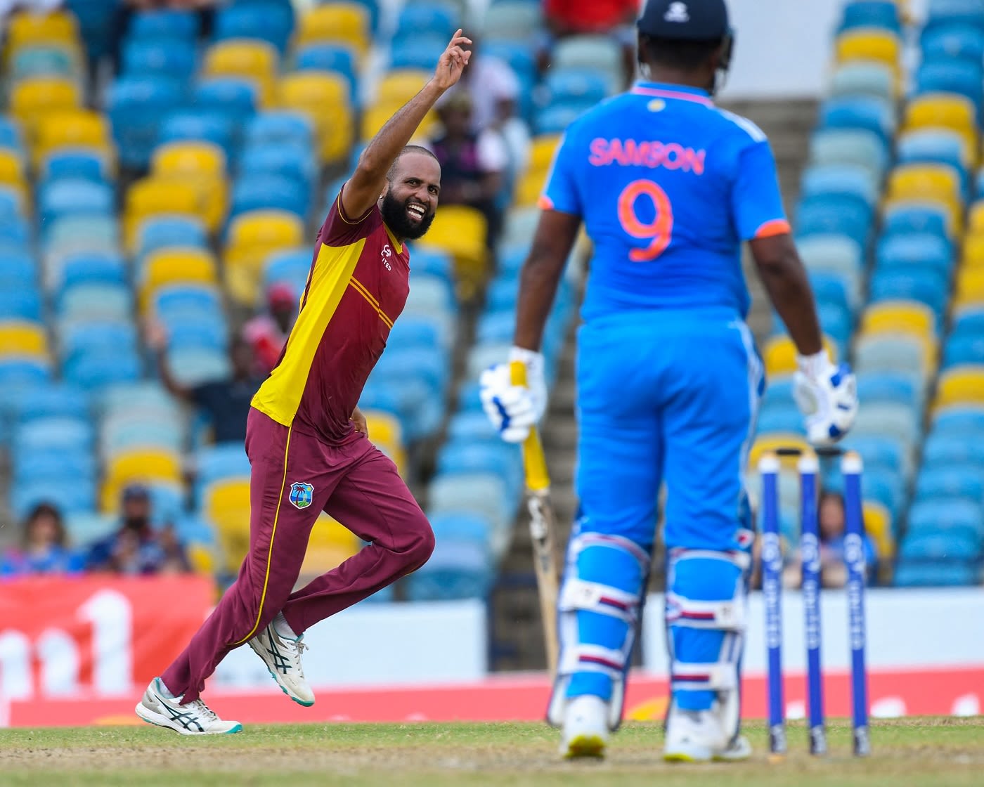 Yannic Cariah wheels away in celebration after getting Sanju Samson to edge one to slip
