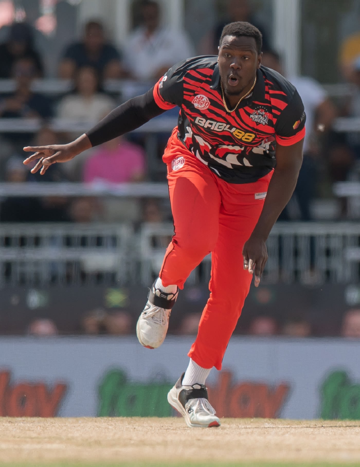 Carlos Brathwaite bends his back