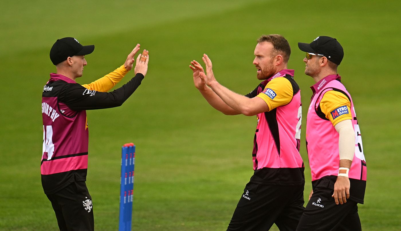 Danny Lamb gets high fives from a team-mate