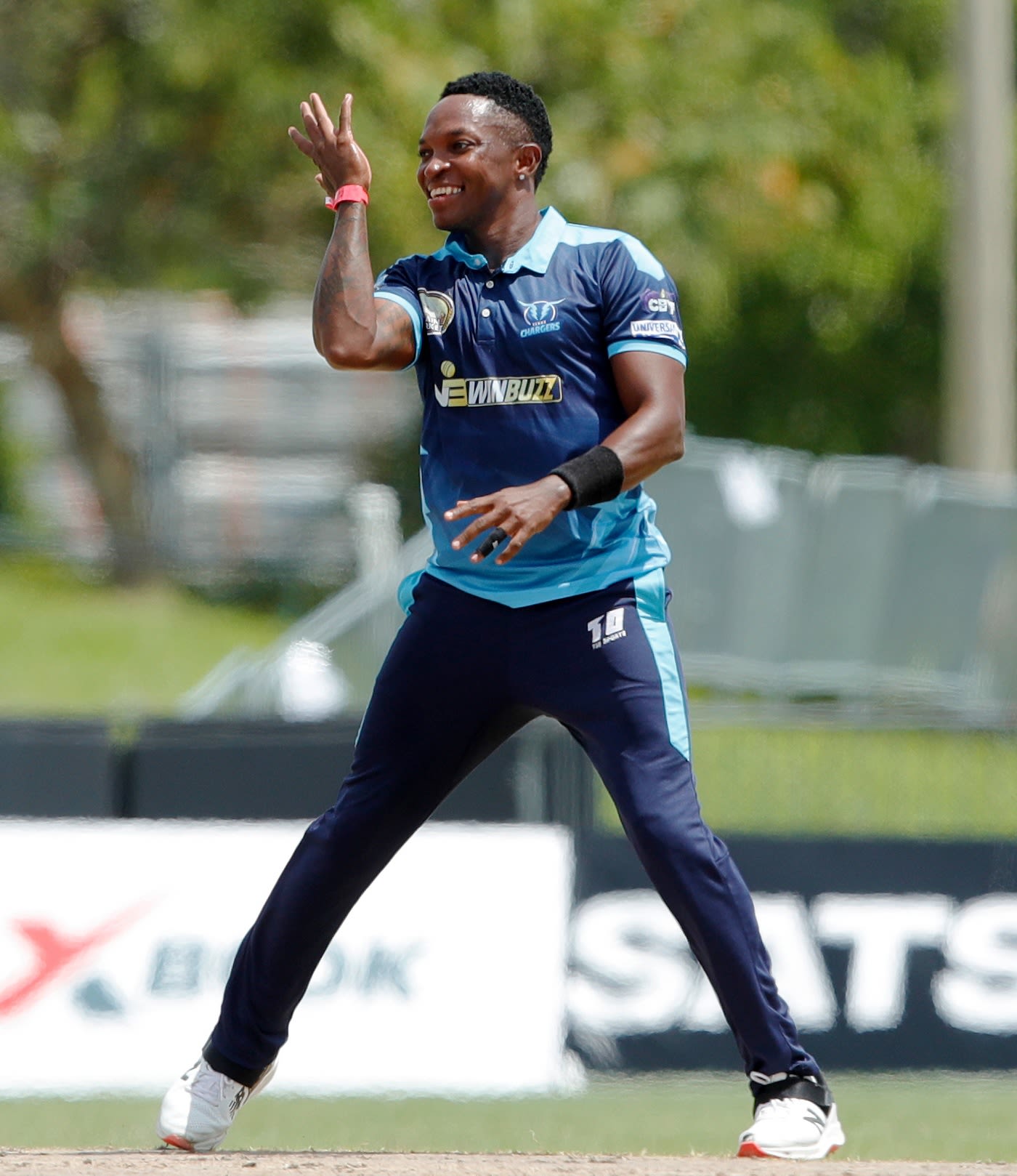 Fidel Edwards celebrates his hat-trick