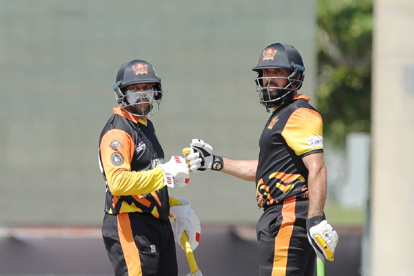 Player of the Match Misbah-ul-Haq shares a moment with partner Tillakaratne Dilshan