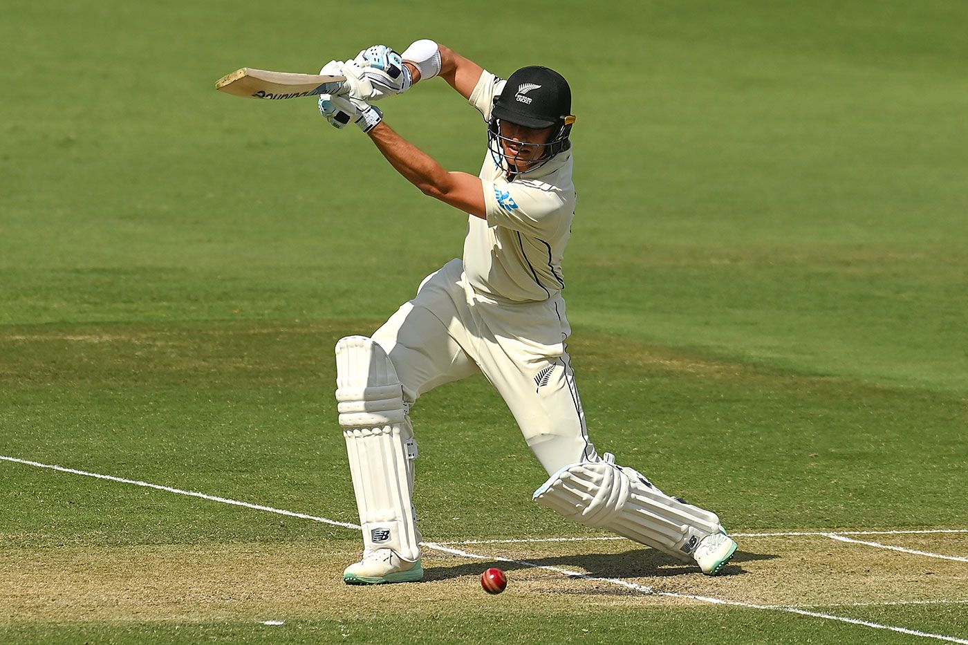 Sean Solia drives through the covers