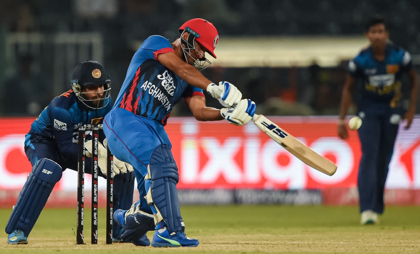 Najibullah Zadran prepares to slap one away
