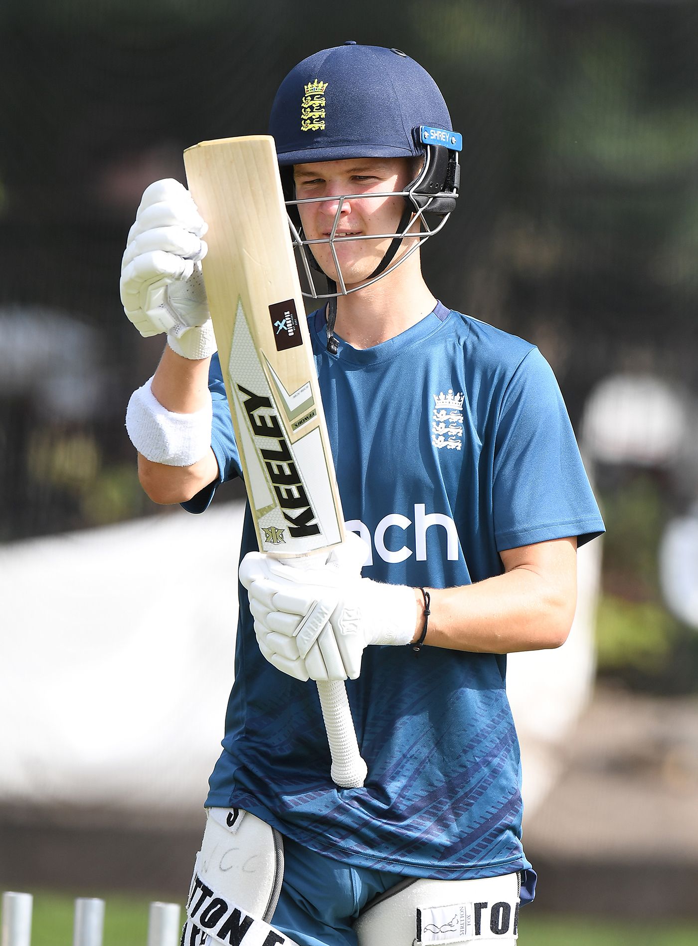 Jadyn Denly inspects his bat