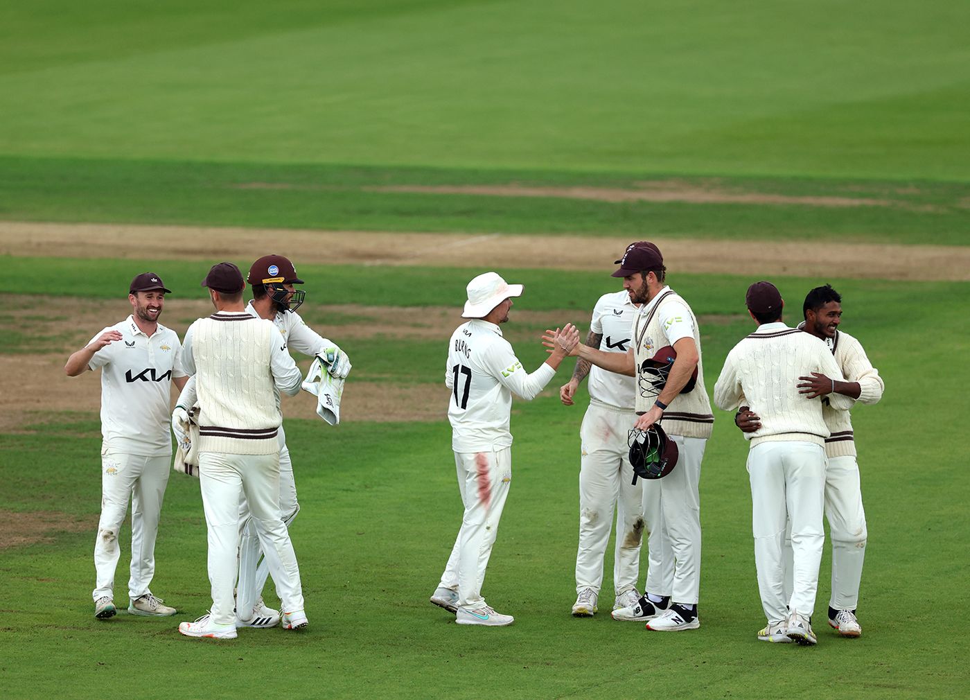 Surrey celebrate after their Championship title retention was confirmed