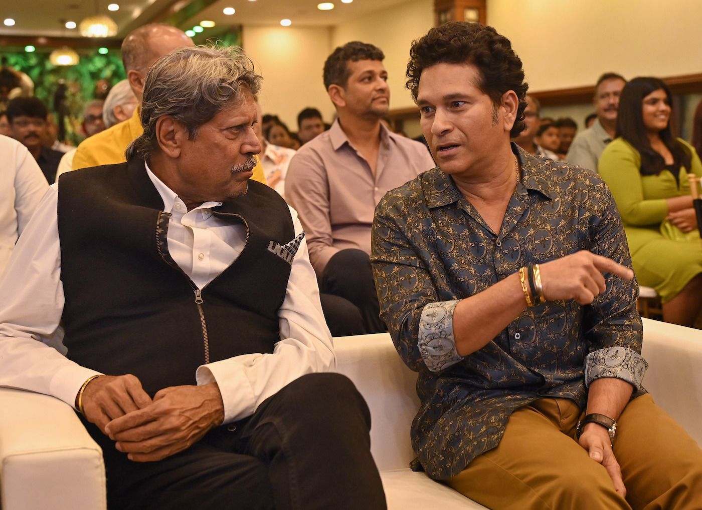 Kapil Dev and Sachin Tendulkar catch up at an event