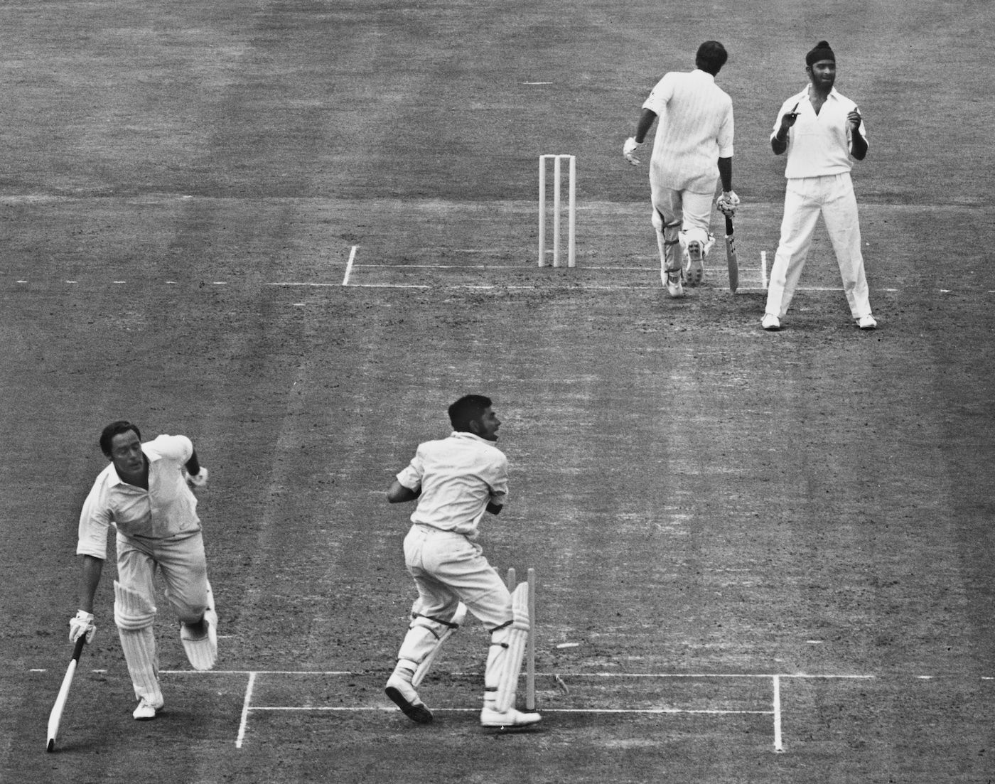 Farokh Engineer runs John Jameson out off the bowling of Bishan Singh Bedi