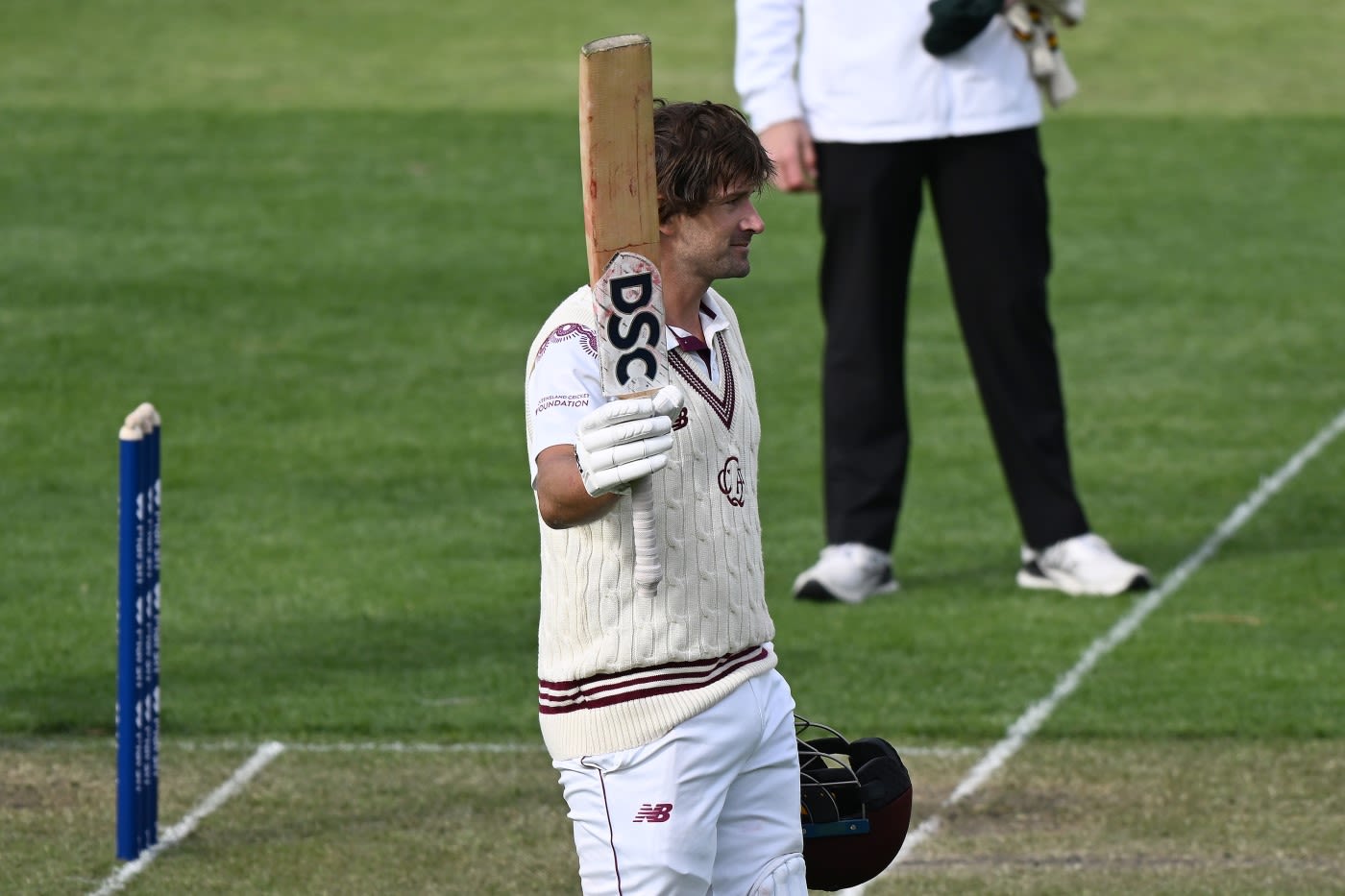 Joe Burns celebrates his century
