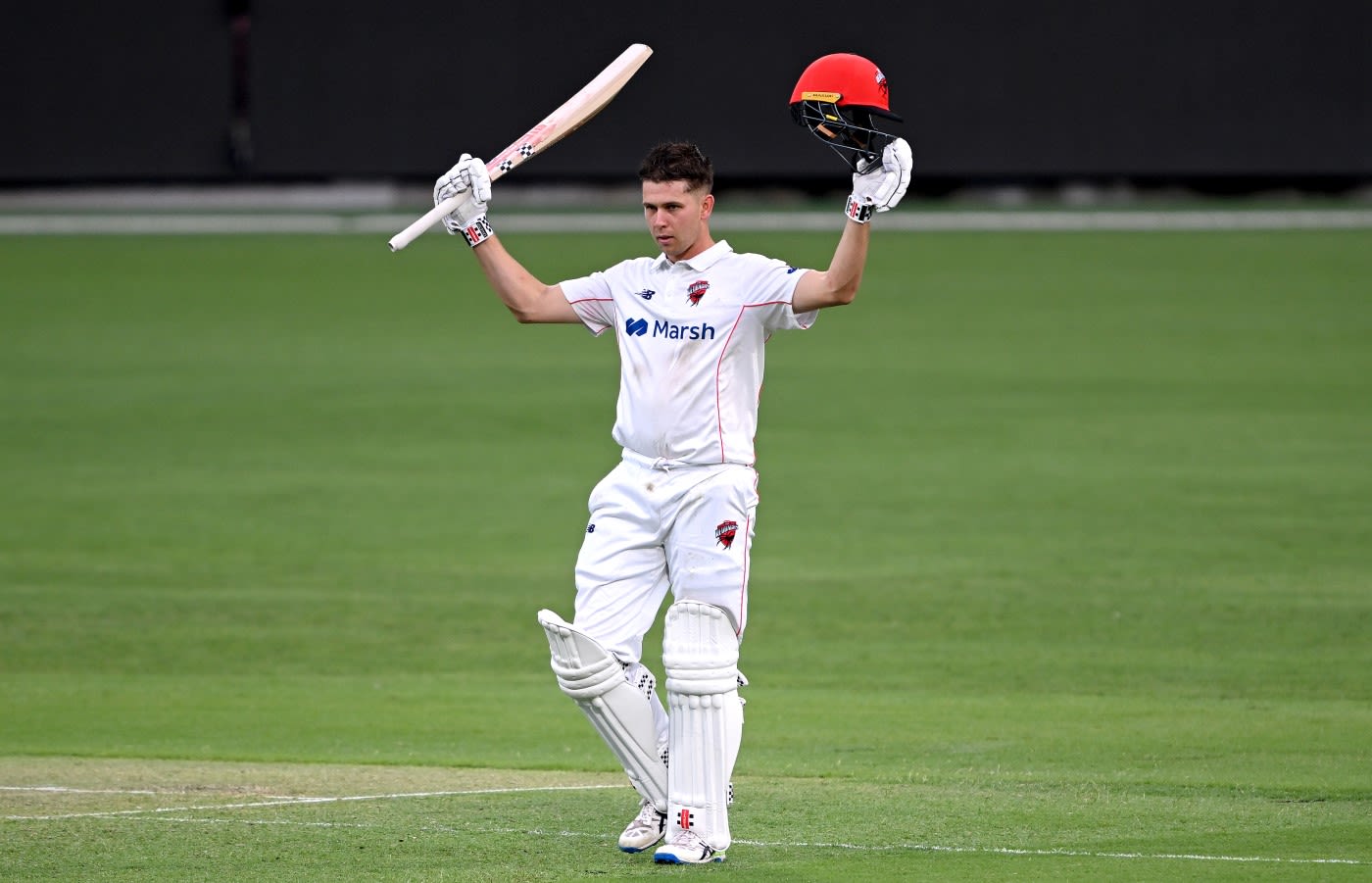 Henry Hunt celebrates reaching his century