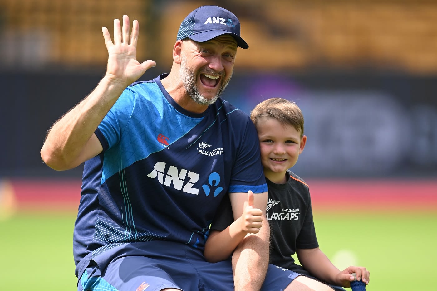 New Zealand bowling coach Shane Jurgensen with his son at a training session