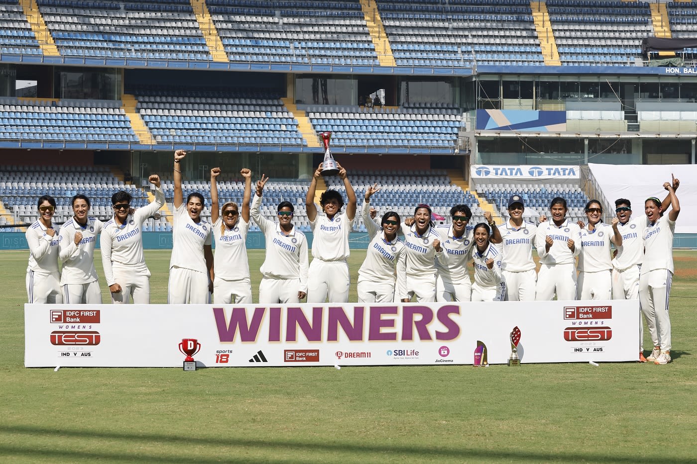 The winning Indian team is all smiles after registering a historic win against Australia