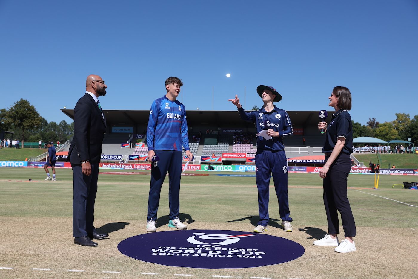 Ben McKinney calls correctly as Owen Gould flips the coin