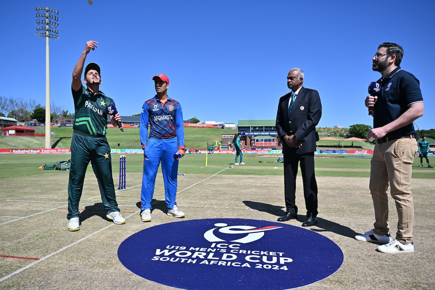 Saad Baig flips the coin - Naseer Khan Maroofkhil called wrong and had to field first