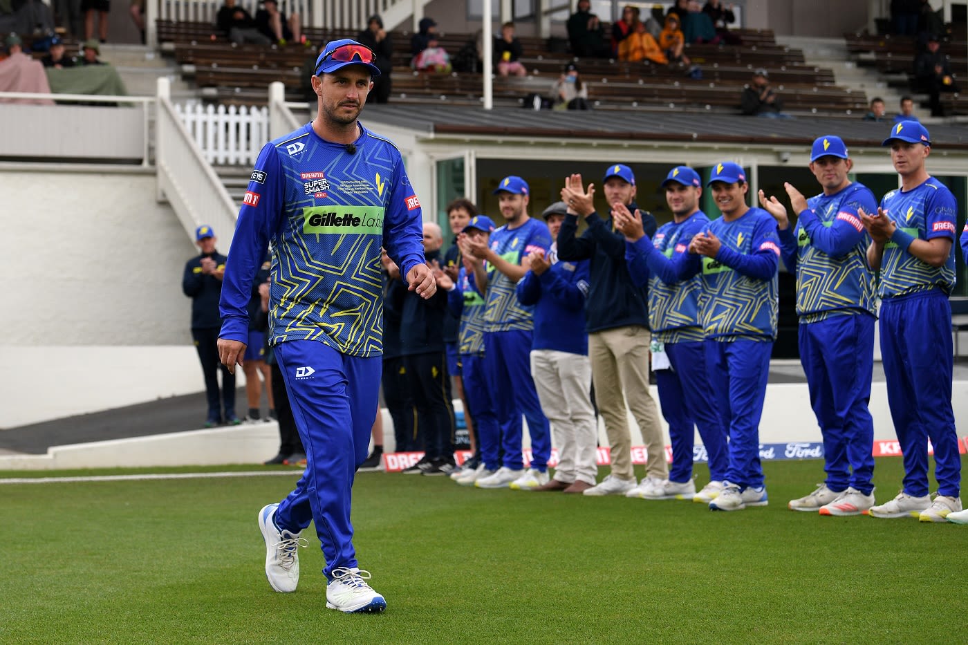 Hamish Rutherford walks out for his last T20 match