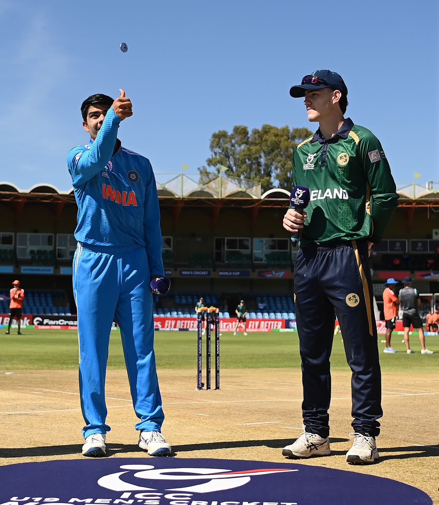 Uday Saharan spins the coin as Philippus le Roux calls