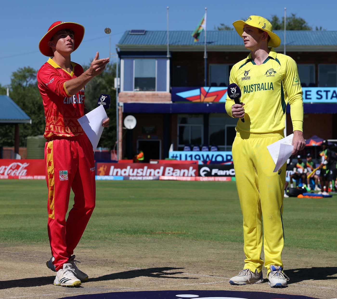 Hugh Weibgen calls as Matthew Schonken tosses the coin