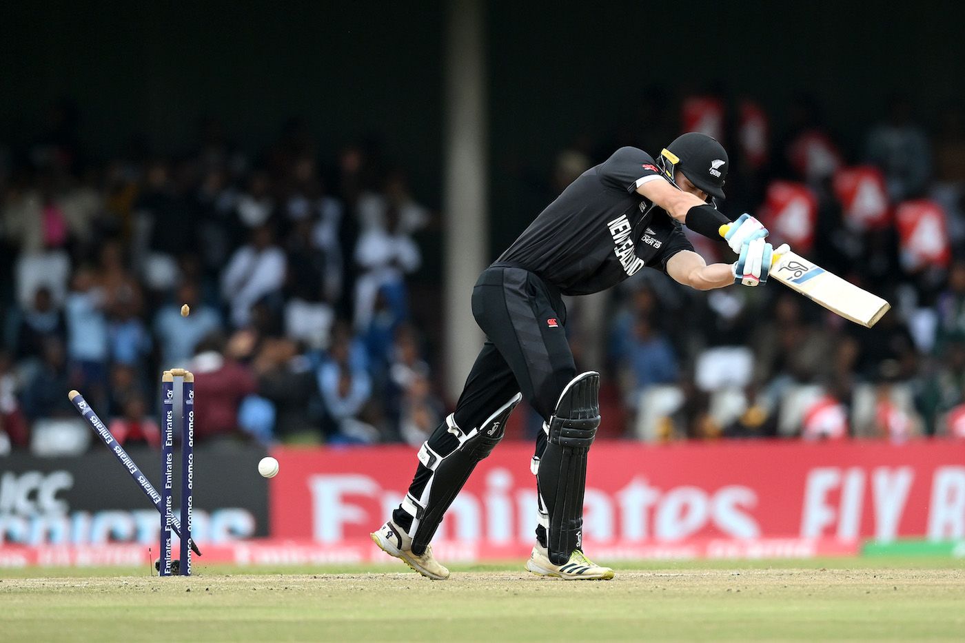 Luke Watson loses his stumps to Ubaid Shah