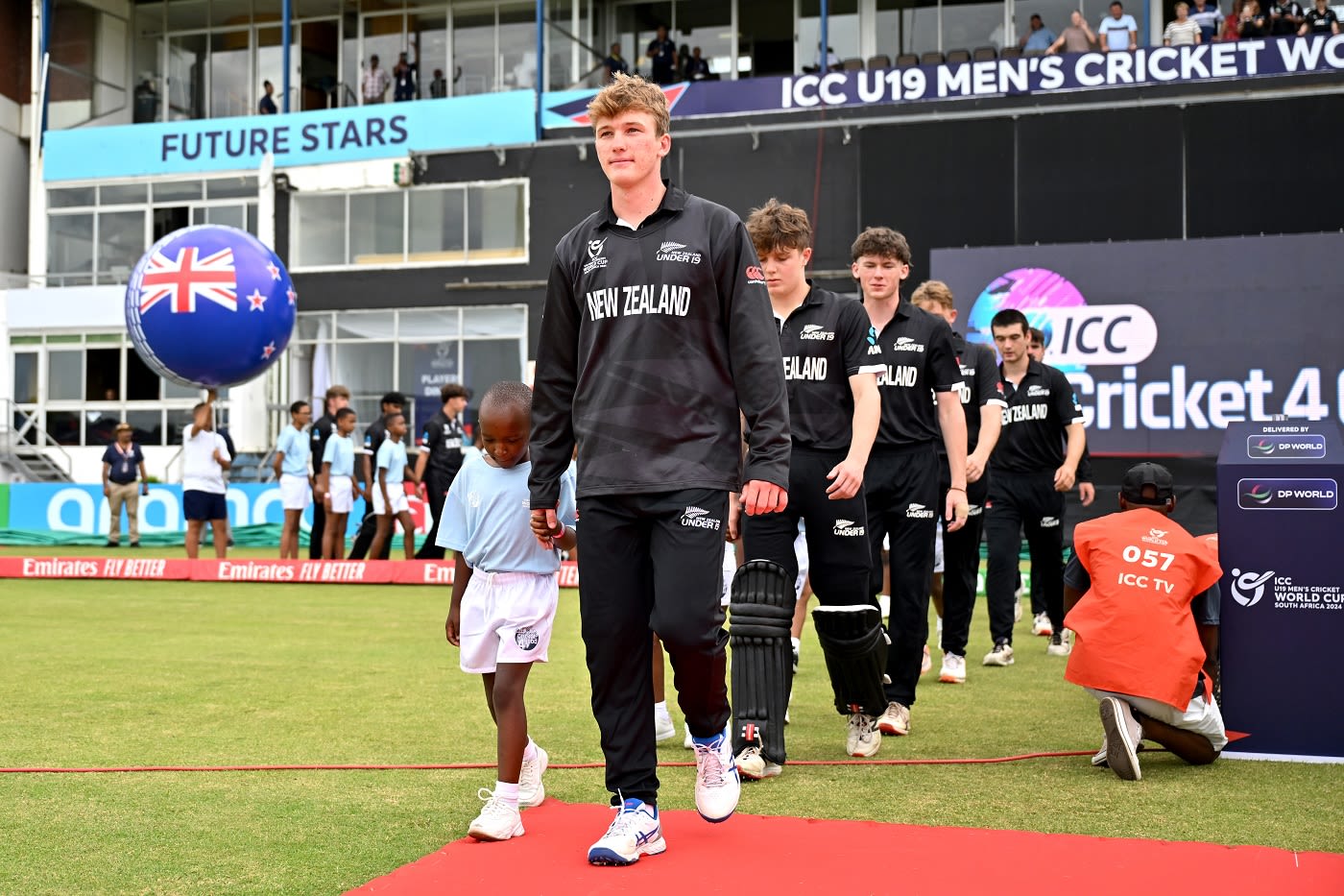 Oscar Jackson leads New Zealand onto the field