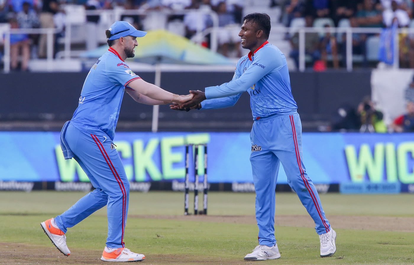 Senuran Muthusamy celebrates a wicket with his captain Wayne Parnell