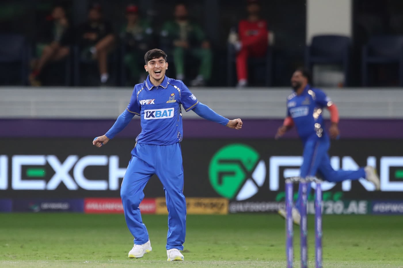Muhammad Rohid celebrates a wicket