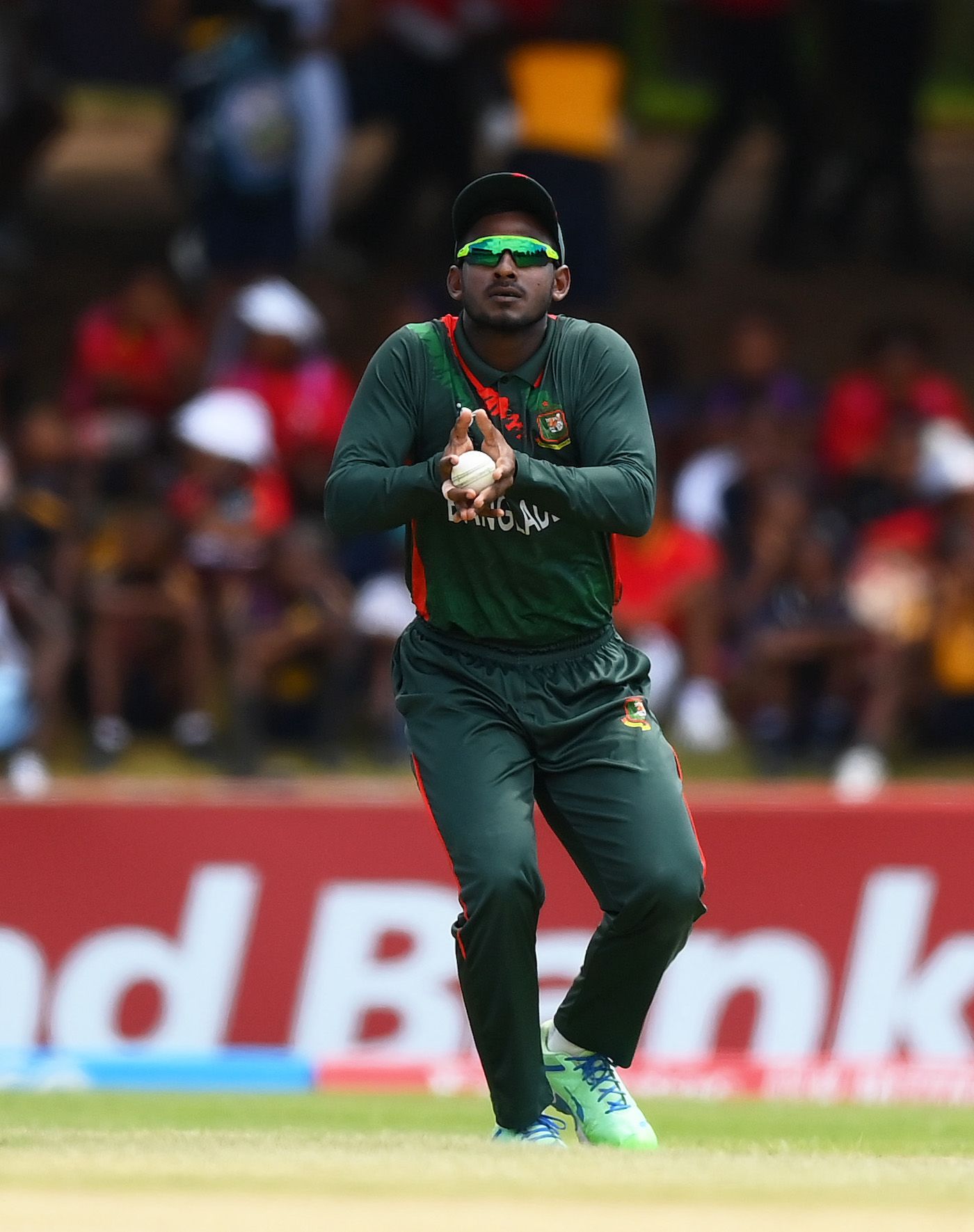 Mahfuzur Rahman Rabby takes the catch to dismiss Aakash Tripathi