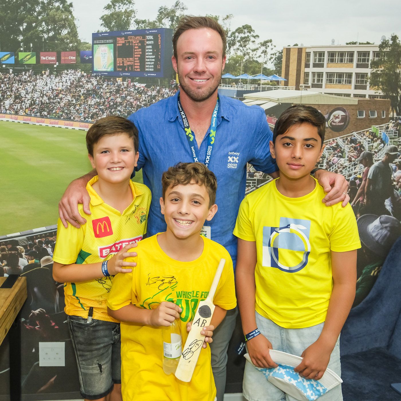 AB de Villiers poses for a picture with young fans