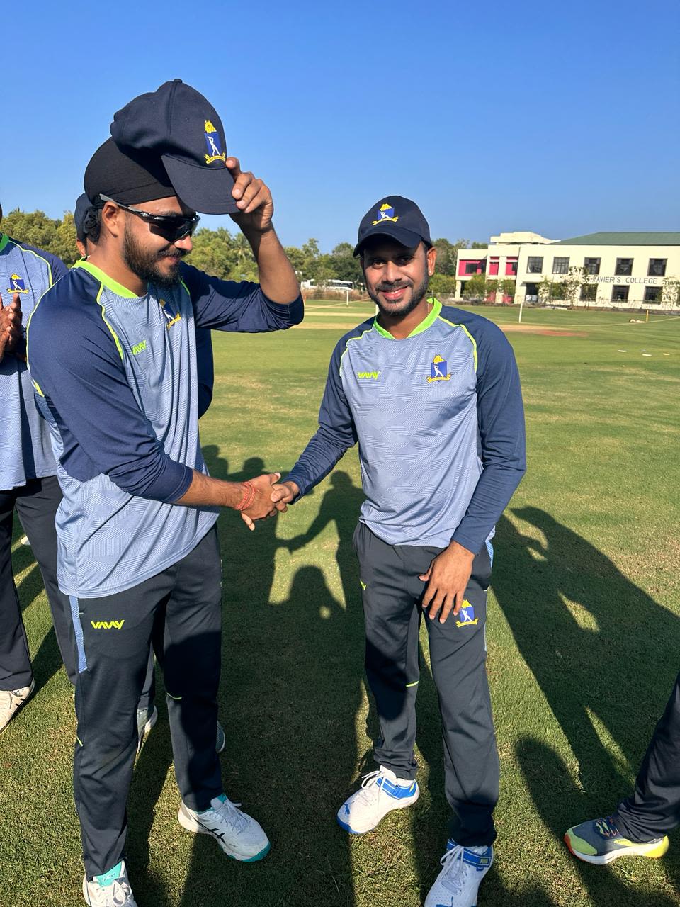 Bengal debutant Ranjot Singh Khaira gets his cap from Manoj Tiwary