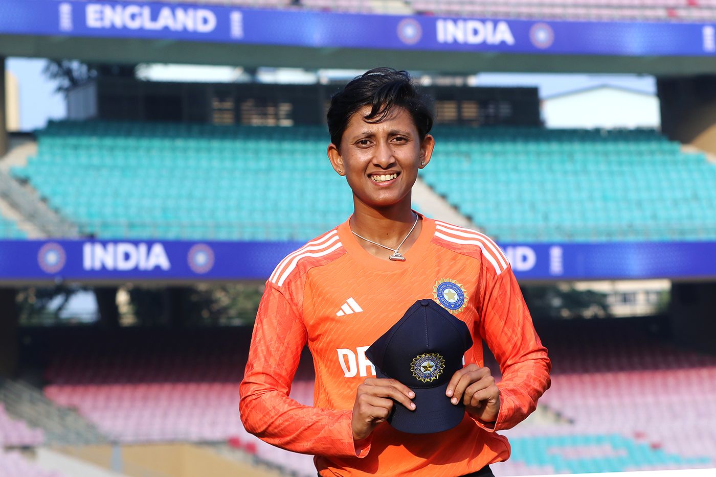 Satheesh Shubha poses with her Test cap