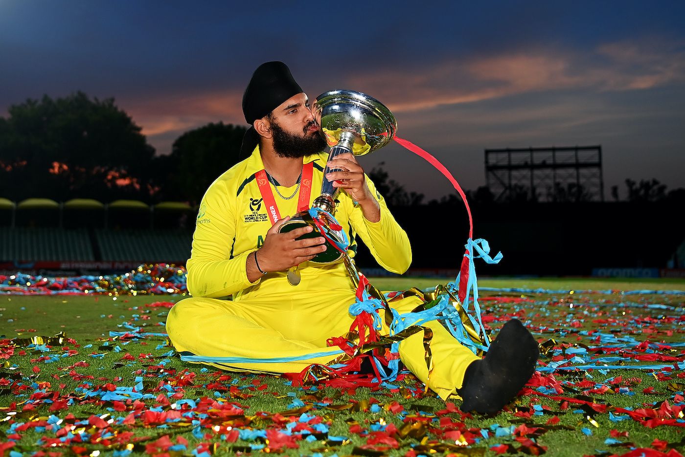 Harjas Singh kisses the Under 19 World Cup trophy