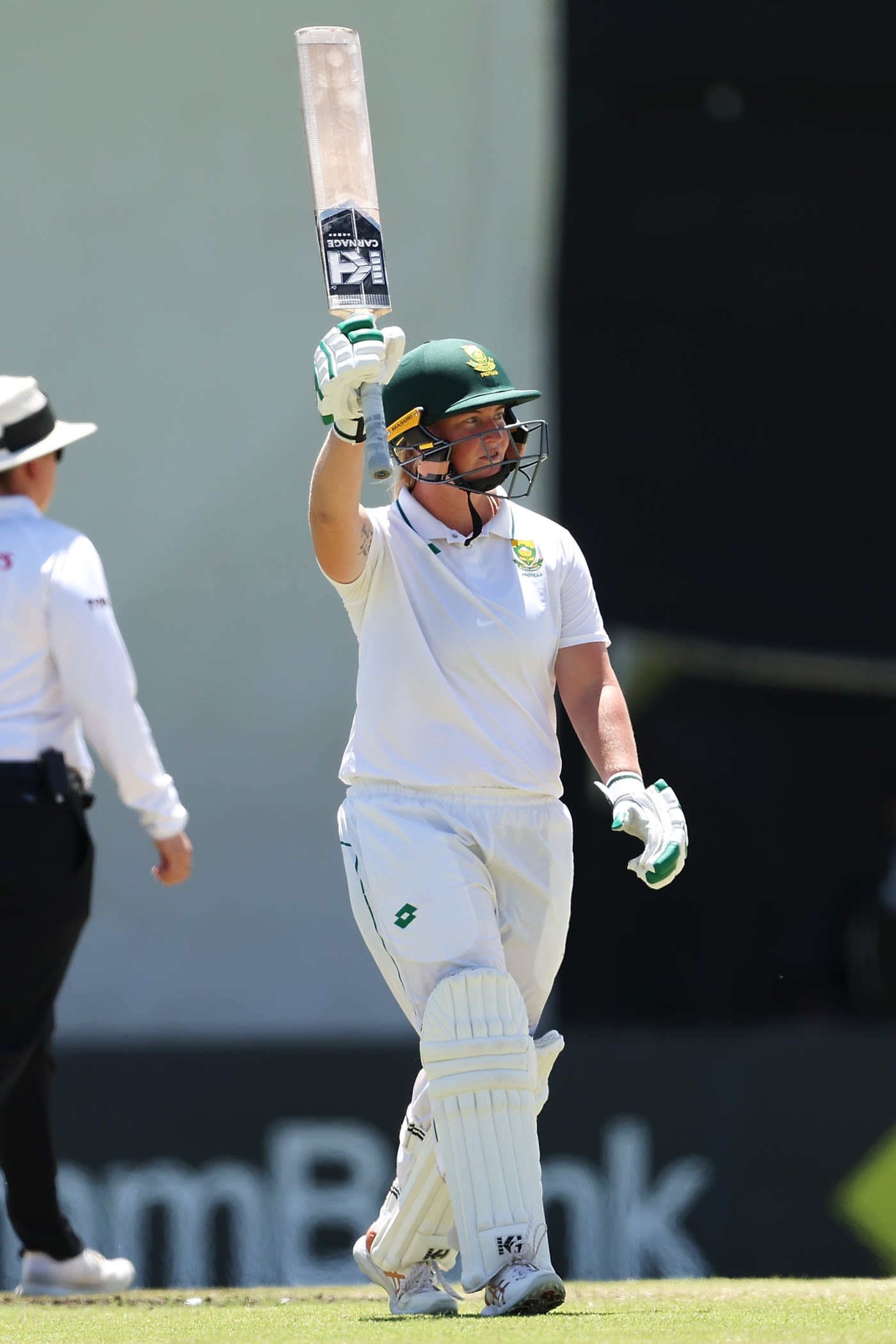 Delmi Tucker raises her bat for her maiden Test half-century