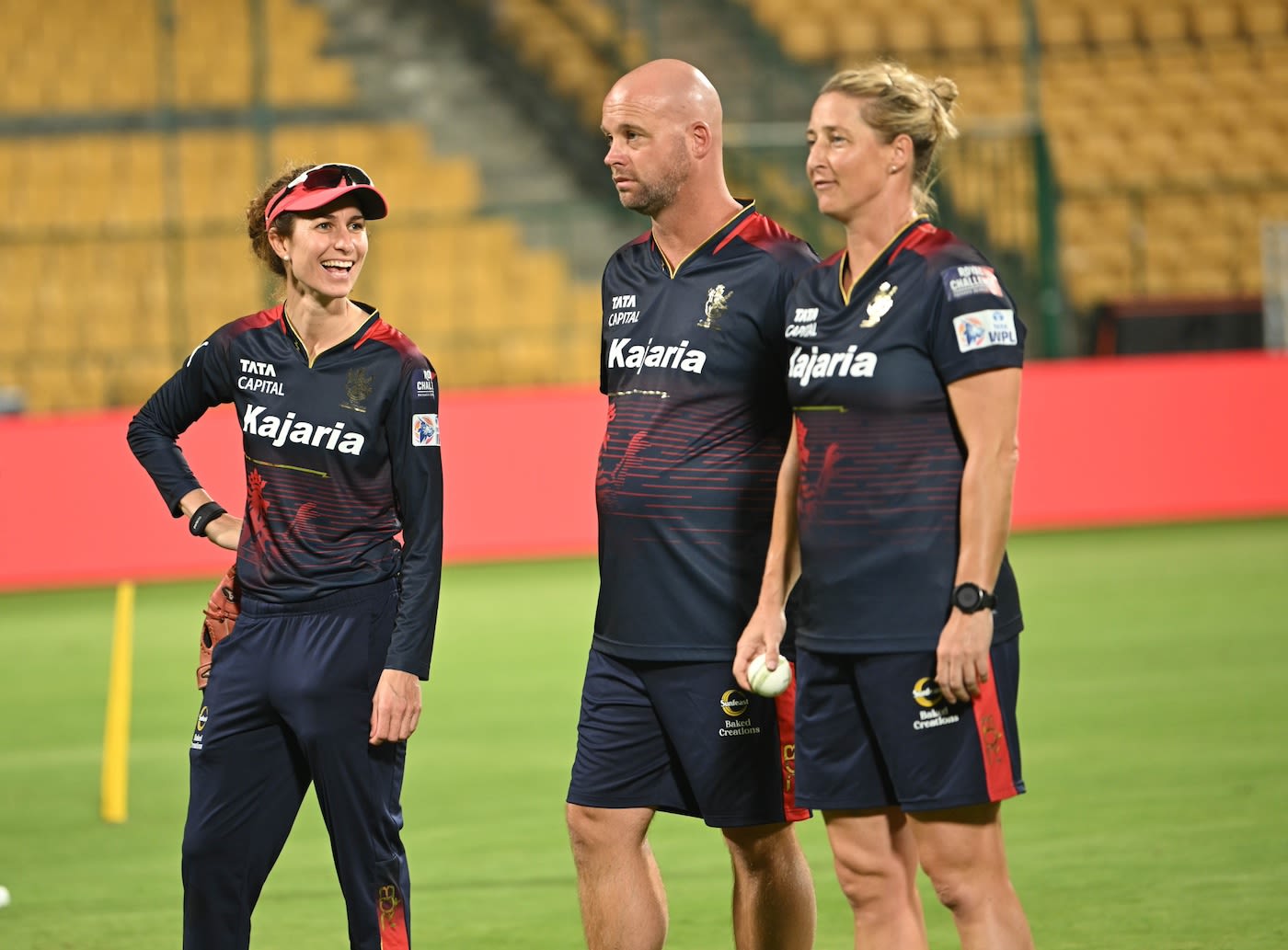 Sophie Devine at a nets session with head coach Luke Williams in the middle