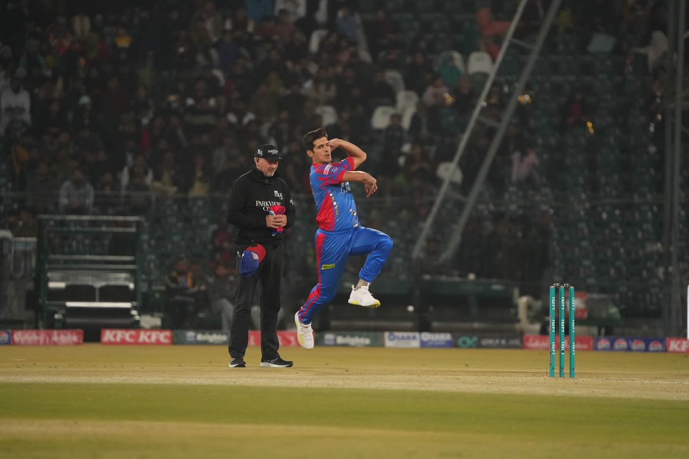 Mir Hamza loads up to bowl