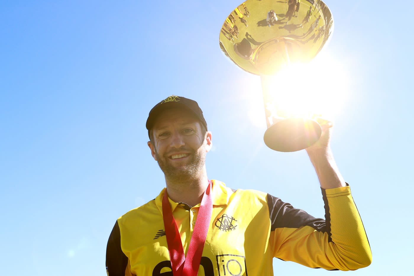 Andrew Tye with the Marsh Cup