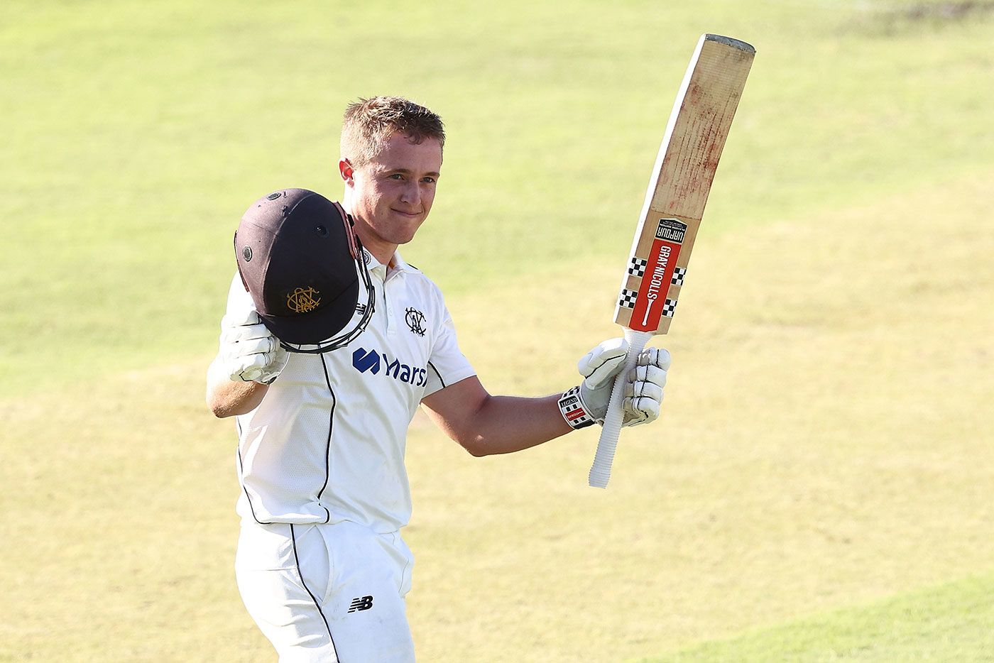 Jayden Goodwin celebrates his maiden first-class hundred