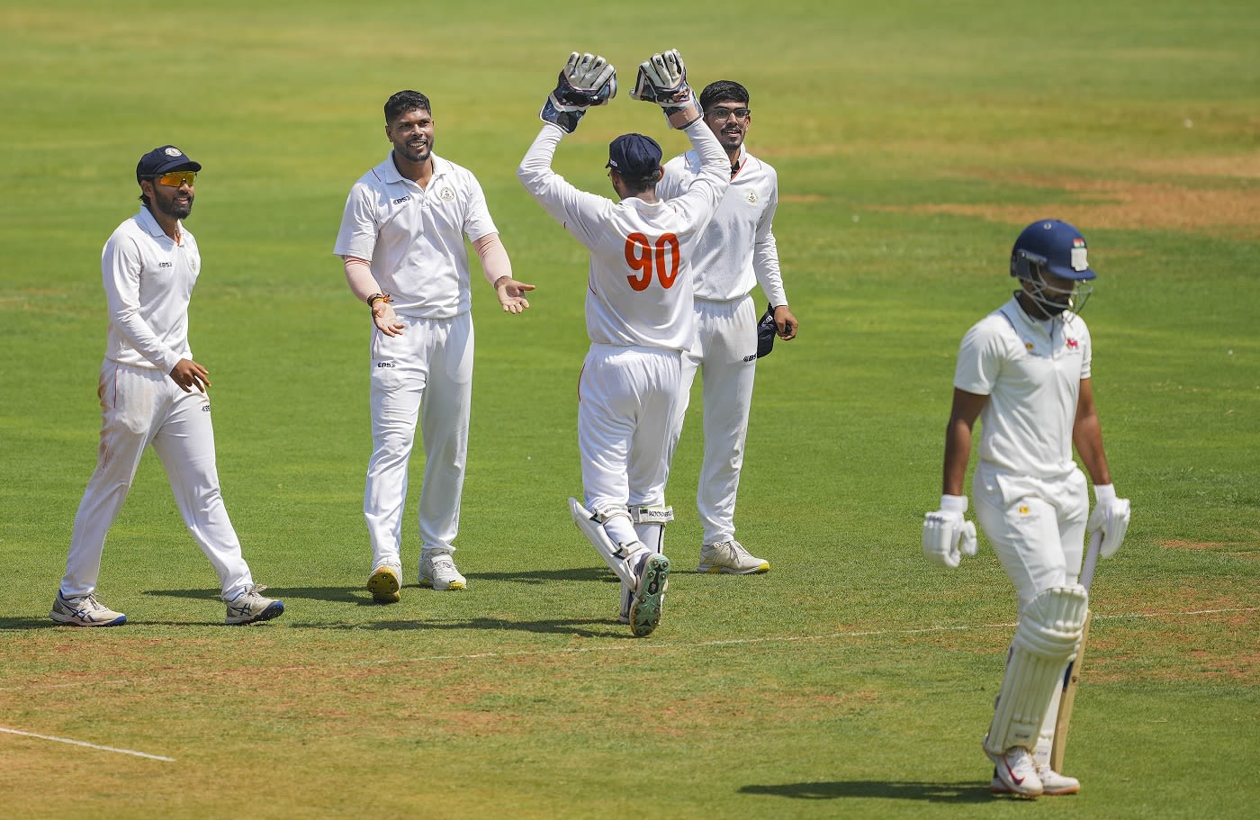 Umesh Yadav celebrates the wicket of Shreyas Iyer